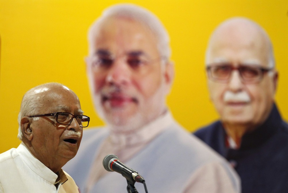 Bharatiya Janata Party (BJP) leader Lal Krishna Advani addresses his supporters during an election campaign in Ahmedabad, April 20, 2014. REUTERS/Amit Dave/Files